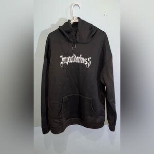 Black and white hoodie with design in the front and back. Very warm inside.